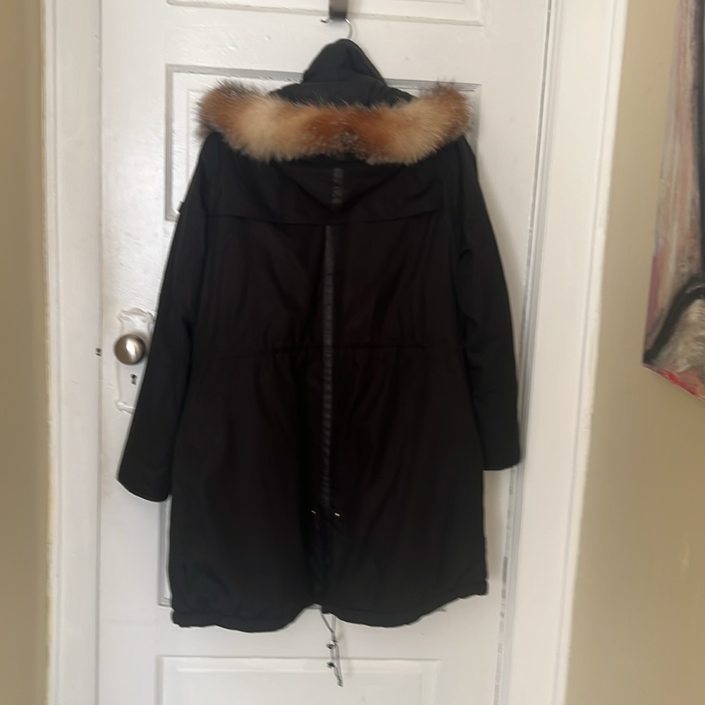 Tumi travel coat